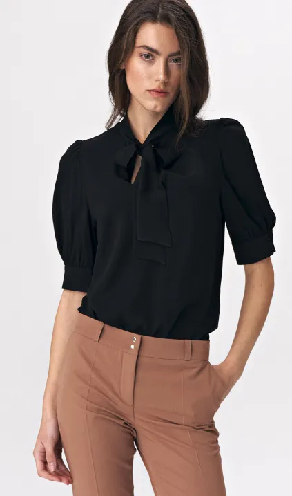 Elegant black blouse with a tie on the neckline