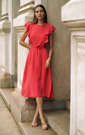 Coral dress with ruffles on the shoulder