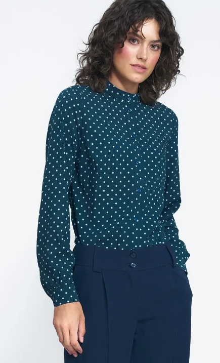 Green blouse in polka dots